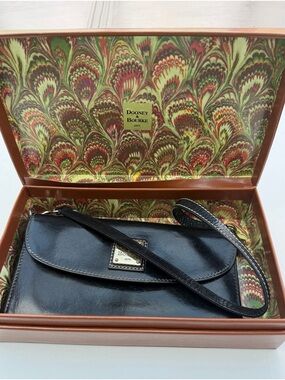 Dooney  and Bourke black leather small handbag in good condition.